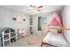 bedroom with pink accents and plenty of storage at 228 Ridge Mill Dr, Acworth, GA 30102