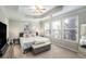 Spacious Primary bedroom with king-size bed and ample natural light at 228 Ridge Mill Dr, Acworth, GA 30102