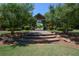 Brick pathway leads to community entrance with covered pavilion at 228 Ridge Mill Dr, Acworth, GA 30102