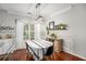 Dining room with farmhouse-style table and striped tablecloth at 228 Ridge Mill Dr, Acworth, GA 30102