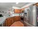 L-shaped kitchen with stainless steel appliances and granite countertops at 228 Ridge Mill Dr, Acworth, GA 30102