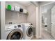 Convenient laundry room with washer and dryer at 228 Ridge Mill Dr, Acworth, GA 30102