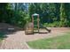 Community playground with wooden playset and benches at 228 Ridge Mill Dr, Acworth, GA 30102