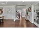 Grand entryway with hardwood floors, staircase, and console table at 5330 Austrian Pine Ct, Cumming, GA 30040