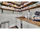 Well-organized pantry with ample shelving and wood countertops at 5330 Austrian Pine Ct, Cumming, GA 30040