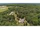 Aerial view showcasing house and expansive surrounding land at 675 Jack Page Ln, Canton, GA 30115