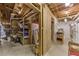 Unfinished basement with ample storage shelving and workshop area at 675 Jack Page Ln, Canton, GA 30115