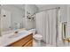 Small bathroom with single vanity and shower/tub combo at 675 Jack Page Ln, Canton, GA 30115