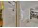 Bathroom with shower, bathtub, and walk-in closet access at 675 Jack Page Ln, Canton, GA 30115