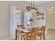 Breakfast nook features a wood table with seating for four and bright windows at 675 Jack Page Ln, Canton, GA 30115