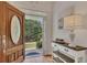 Bright entryway with hardwood floors and a console table at 675 Jack Page Ln, Canton, GA 30115