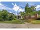 Brick house with a walkway leading to the front porch at 675 Jack Page Ln, Canton, GA 30115