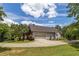 House exterior showcasing a two-car garage and driveway at 675 Jack Page Ln, Canton, GA 30115