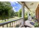 Relaxing front porch with wooded views at 675 Jack Page Ln, Canton, GA 30115