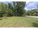 Landscaped front yard with lush green grass at 675 Jack Page Ln, Canton, GA 30115