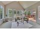 Sunroom with wicker furniture and access to deck at 675 Jack Page Ln, Canton, GA 30115