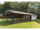 Outdoor pavilion with picnic tables and small storage building at 1065 Benteen Se Ave, Atlanta, GA 30312