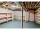 Unfinished basement with shelving and concrete floor at 2364 Oakridge Ct, Decatur, GA 30032