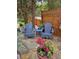 Relaxing patio area with comfortable chairs and colorful flowers at 1239 Bonshaw Trl, Marietta, GA 30064