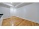 Unfinished basement with hardwood floors and neutral walls at 2571 Sharondale Ne Dr, Atlanta, GA 30305