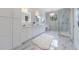 Spa-like bathroom with marble flooring, double vanity, and large shower at 2571 Sharondale Ne Dr, Atlanta, GA 30305