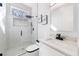 Modern bathroom with herringbone tile shower and marble vanity at 2571 Sharondale Ne Dr, Atlanta, GA 30305