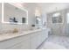 Elegant bathroom featuring a marble shower and double vanity at 2571 Sharondale Ne Dr, Atlanta, GA 30305