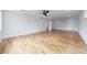 Large bedroom with hardwood floors, ceiling fan, and access to other rooms at 2571 Sharondale Ne Dr, Atlanta, GA 30305