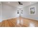 Well-lit bedroom with hardwood floors and ceiling fan at 2571 Sharondale Ne Dr, Atlanta, GA 30305