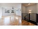 Spacious bedroom with hardwood floors, large windows, and spiral staircase at 2571 Sharondale Ne Dr, Atlanta, GA 30305
