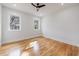 Bright bedroom with hardwood floors and ceiling fan at 2571 Sharondale Ne Dr, Atlanta, GA 30305
