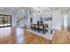 Open concept dining area with hardwood floors and modern light fixture at 2571 Sharondale Ne Dr, Atlanta, GA 30305