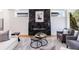 Modern fireplace with black marble surround in living room at 2571 Sharondale Ne Dr, Atlanta, GA 30305