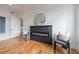 Modern living room with a sleek dark gray fireplace and hardwood floors at 2571 Sharondale Ne Dr, Atlanta, GA 30305