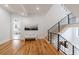 Bright hallway with hardwood floors and a view of a bedroom at 2571 Sharondale Ne Dr, Atlanta, GA 30305