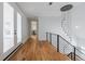 Hardwood floor hallway with access to deck and additional rooms at 2571 Sharondale Ne Dr, Atlanta, GA 30305
