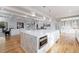Modern kitchen with white cabinetry, marble countertops, and stainless steel appliances at 2571 Sharondale Ne Dr, Atlanta, GA 30305