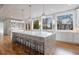 Modern kitchen with white cabinetry, marble countertops, and stainless steel appliances at 2571 Sharondale Ne Dr, Atlanta, GA 30305