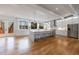 Modern kitchen with white cabinetry, marble countertops, and stainless steel appliances at 2571 Sharondale Ne Dr, Atlanta, GA 30305