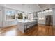 Modern kitchen with marble island, stainless steel appliances, and hardwood floors at 2571 Sharondale Ne Dr, Atlanta, GA 30305