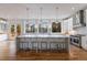 Modern kitchen with white cabinetry, marble countertops, and stainless steel appliances at 2571 Sharondale Ne Dr, Atlanta, GA 30305