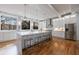 Modern kitchen with white cabinetry, marble countertops, and stainless steel appliances at 2571 Sharondale Ne Dr, Atlanta, GA 30305