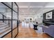Open concept living space with hardwood floors, fireplace, and modern furniture at 2571 Sharondale Ne Dr, Atlanta, GA 30305
