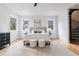 Bright and airy main bedroom with hardwood floors and a ceiling fan at 2571 Sharondale Ne Dr, Atlanta, GA 30305