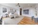 Large main bedroom with hardwood floors, a ceiling fan and spiral staircase at 2571 Sharondale Ne Dr, Atlanta, GA 30305