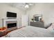 Spacious bedroom featuring a fireplace and built-in shelving at 5029 David Pl, Smyrna, GA 30082