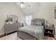 Bright bedroom with gray furnishings and a large window at 5029 David Pl, Smyrna, GA 30082