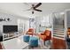 Open concept living room with kitchen and stairs at 5029 David Pl, Smyrna, GA 30082