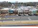 Aerial view of commercial buildings and street parking at 164 Goshen Ln, Woodstock, GA 30188