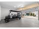 Bright garage with golf cart and open view at 164A Goshen Ln, Woodstock, GA 30188